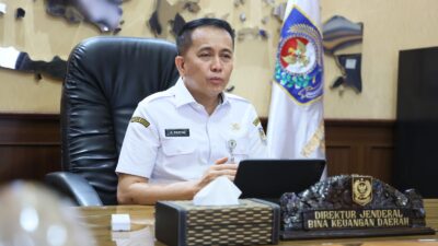 Dirjen Bina Keuangan Daerah Kemendagri Agus Fatoni saat Launching SP2D Online dan KKPD Papua Tengah 2026`