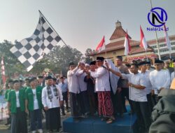 Wakil Walikota Tangerang Maryono Lepas Pawai Maulid dengan Kibarkan Bendera Start