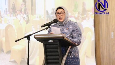 Wakil Bupati Tangerang Intan berpidato di podium saat diskusi GATI